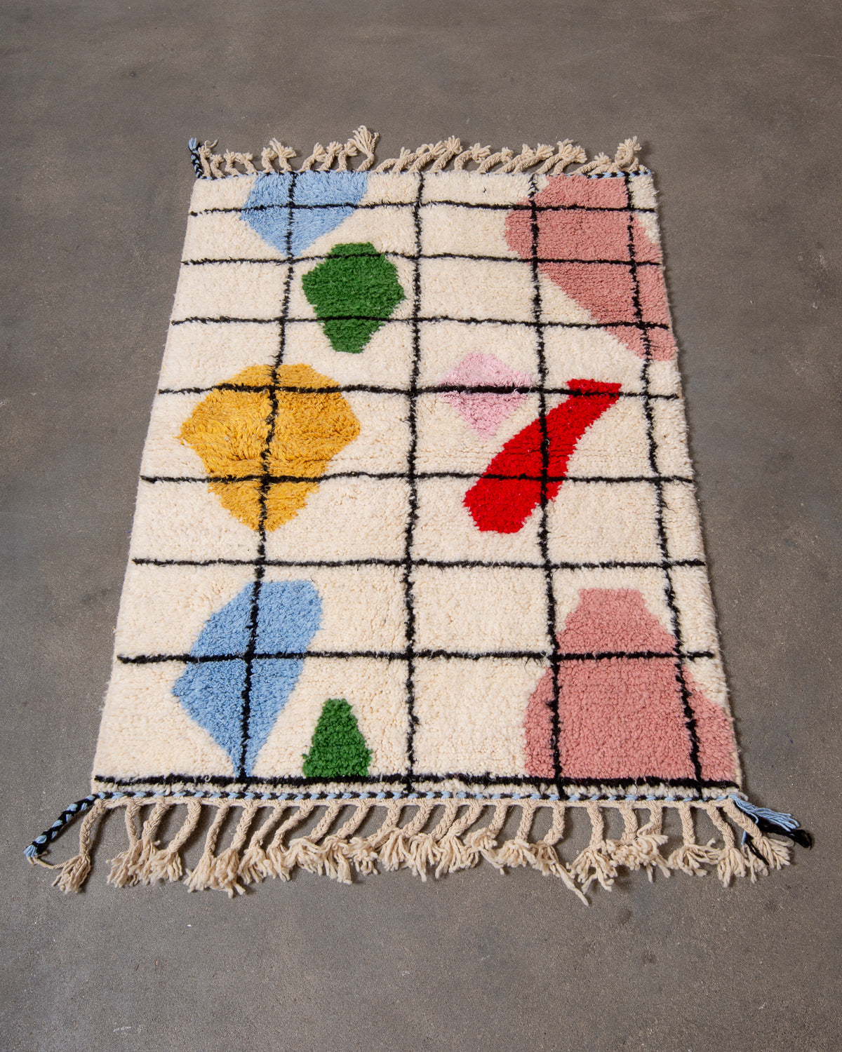 Modern, designer, handcrafted Berber rug from Morocco. Beniourain carpet with beautiful colours and patterns and fluffy wool texture.